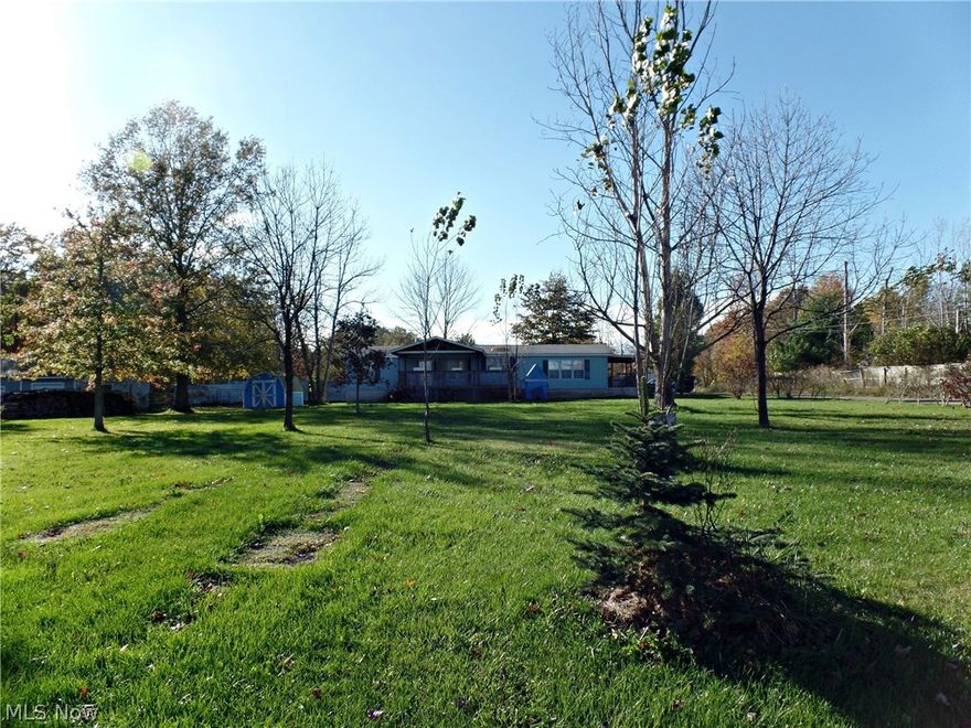 3 bedrooms, 2 bath ranch style home sitting on about an acre.  large living room, formal dining room, family room, and eat in kitchen, 1st floor laundry!   Covered front and back porches!  Quiet corner lot.  Home warranty is included for a worry-free purchase!  Updates include newer roof, furnace, hot water tank, insulation, and central air.  Call today for more details!