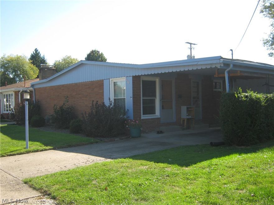 Lot More living space than it looks, over 960+ sq. ft. of living space for this 2 bedroom brick home with family room in basement with new tile and built in bar, level lot.  Cheaper than rent.