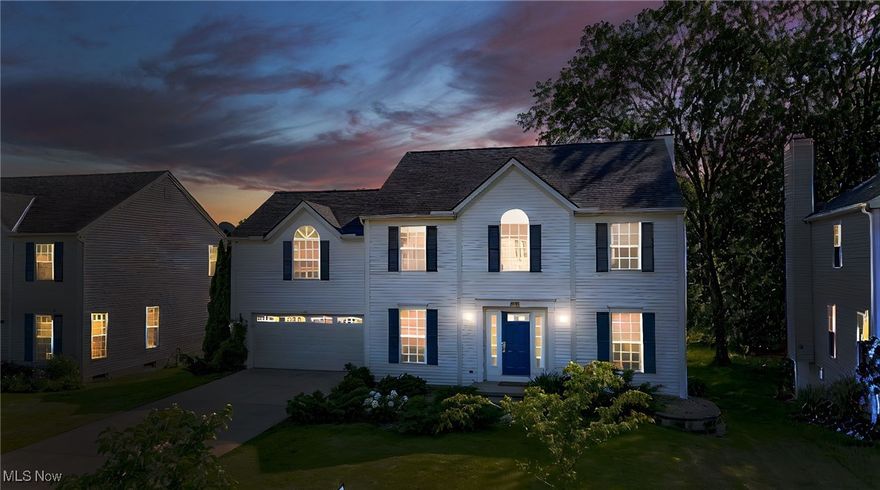 WOW! BRAND NEW ROOF INSTALLED IN 2025. Step into timeless elegance and modern comfort with this beautifully maintained 4-bedroom, 2.5-bath colonial home, perfectly designed for both everyday living and stylish entertaining. From the moment you enter, you’ll be welcomed by a grand two-story foyer that full of warmth, light, and sophistication. The heart of the home is a gourmet chef’s kitchen featuring sleek quartz countertops, premium stainless steel appliances, a spacious breakfast room with panoramic backyard views, and upgraded luxury vinyl plank flooring (2023). Perfect for entertaining, the main level includes formal living and dining rooms, a warm and welcoming family room with a cozy gas fireplace, and a thoughtfully placed half bath with a hallway serving area. Upstairs, the luxurious owner’s suite is a true retreat with dual walk-in closets, a spa-inspired bath complete with twin vanities, garden tub, glass-enclosed shower, and a private water closet. Three additional spacious bedrooms, a full hallway bath, ample walk-in closet space, and an upstairs laundry room complete the upper level. The walkout lower level offers three separate and flexible entertainment areas—ideal for a home theater, gym, playroom, or office. Step outside onto the expansive deck that spans the entire back of the home, where you’ll enjoy sweeping sunset views over an unusually large, private backyard—rarely found in this area. With numerous updates including new carpet and interior paint (2025), dishwasher (2024), high-efficiency HVAC (2023), hardwood floors (2022), kitchen quartz (2022), gutter guards (2021), and a hot water tank (2018), this home is move-in ready. Perfectly located with quick access to Cleveland, Akron, and Youngstown, and just minutes from major travel routes, upscale shopping, trendy eateries, and the Aurora Premium Outlets—this is more than a home, it’s a lifestyle. Schedule your private showing today before this gem is gone!