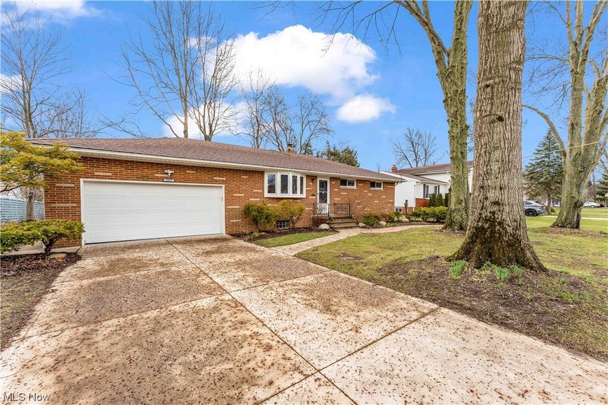 This incredible, fully renovated North Olmsted ranch will not last long! The beautiful brick home sits on a quarter acre lot with large shade trees and huge fenced-in back yard! Inside the welcoming home, you'll find a bright and modern interior featuring beautiful hardwood floors in the main living area and bedrooms, central air for staying cool in the summer and fresh paint, high end finishes and more throughout! There is a large living room flooded with light from the charming bay window, formal dining room with access to the rear patio and completely updated kitchen with new LVP flooring, new white cabinets and metal hardware, granite countertops, new fixtures and all new stainless steel appliances! There are 4 good sized bedrooms, a beautifully renovated full bath with gorgeous vanity, LVP flooring, subway tile tub surround and new fixtures and shelving and an updated half bath on the main floor as well! There is also a finished basement rec room with new LVP flooring that's perfe