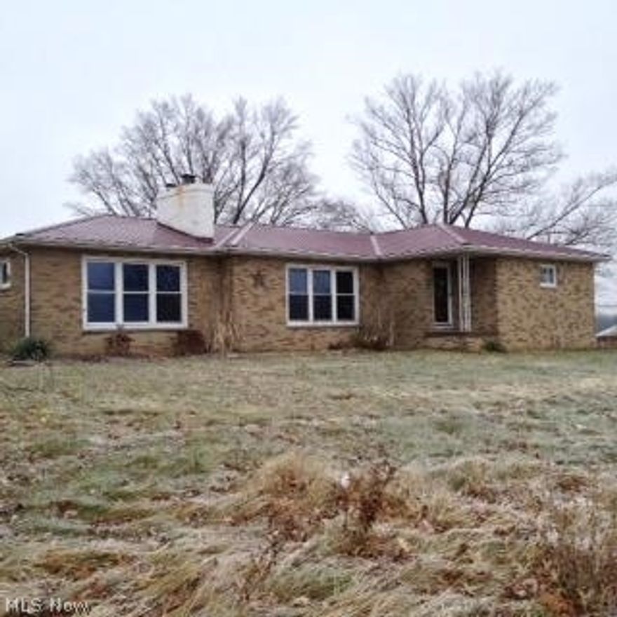 Brick home with detached garage. Home needs some "TLC" bit has great potential. Third party authorization on all documents.