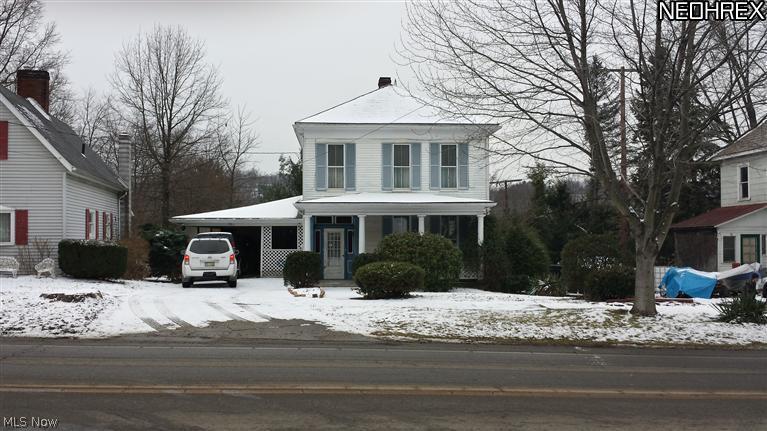 Wonderful home with 3 or 4 bedrooms, 2.5 baths, has been a long time family home, estate home needs to sell. Very clean. Gorgeous stair system from foyer to 2nd floor. TALL Ceilings about 10' high on 1st floor, bright and airy with tall windows as well. Huge carport, 2 sheds, close to school, firehouse is across the street and the library is only 3 doors down, convenient location with grocery store a block away as well as gas station and drug store close proximity! There is a 4th room on 2nd floor off the bathroom that was a 2nd floor kitchen previously that can be used as a 4th bedroom or home office or 2nd floor living room. Also a kitchen and bath area located in the basement. This home could be split into separate rentals. Will sell furnished or unfurnished. With some new carpet and a little TLC this is a fabulous home! Mineral Rights will not transfer, mineral rights are already under contract.