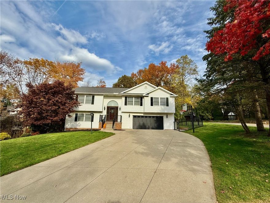 WOW!  Is what you'll be saying when you tour this updated 4 bed, 3 full bath home in the desired neighborhood of Hunters Crossing in Stow.  There are way too many updates to list so make sure your agent gets you the update list!  This home is perfect for entertaining inside and out.  Whether you are cooking up a meal in the updated kitchen,  playing games in the downstairs rec room, lounging out back on the oversized re-finished private deck, or soaking in the hot tub, you'll have plenty of options to spread out, enjoy, and relax.  Situated conveniently to Stow Schools, shopping, restaurants, parks, and more!  Sellers are offering a free one year home warranty from Americas Preferred.  Schedule your showing now so you don't miss out of this amazing opportunity.