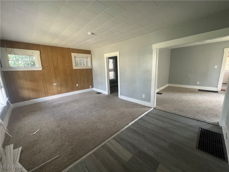 Calling all real estate investors looking for their first or next 2-unit value property! Looking for a light rehab to create force appreciation? This is the perfect investment for you! This duplex features TWO, two-bedroom, one-bathroom units, each with 836 sqft of living space. Each unit has newer flooring, kitchen, and countertops. Put your finishing touches on this property, then sit back and watch the cash flow come in! It is located in a quiet neighborhood just minutes from the Pro Football Hall of Fame, restaurants, and stadium park! Schedule your showing before it is too late!