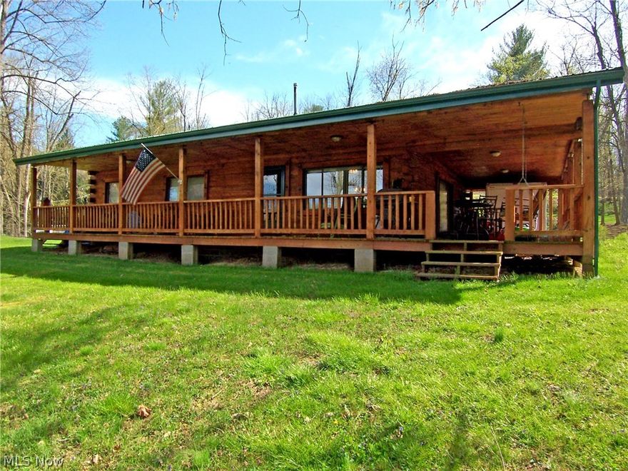 Newer metal roof, carpet. Large front and back porch overlooking the river. Great place to get away or to live in. Nice log home on approx. 1 acre. Flood insurance. Newer stove & frig. 1-2 years old.