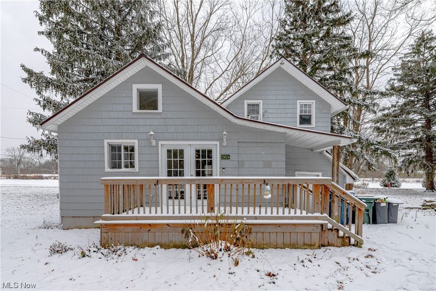 Welcome to this charming and cozy 3 bedroom 1.5 bath colonial located in the beautiful city of Olmsted Falls. This home is situated on a large, wooded lot, with a deck, patio and fire pit providing you with ample space to relax and enjoy nature. The two-story garage offers plenty of storage space, and the first-floor laundry room adds convenience to your daily routine. Step inside and be impressed by the warm and inviting atmosphere of this home. The well-appointed kitchen boasts plenty of counter space, a walk in pantry, newer appliances and a vaulted ceiling. The spacious dining room and living room is perfect for family gatherings or entertaining friends. Upstairs you will find two of the three bedrooms, each with its own unique charm. The home has been updated with a  new complete tear off roof in 2020, water heater 2021, updated windows, bathtub update 2023 and a freshly painted kitchen and dining room. This adorable home is located just a stone's throw away from the charming downtown of Olmsted Falls, offering a variety of restaurants, shops, and entertainment options. Don't miss out on the opportunity to make this lovely house your home today!