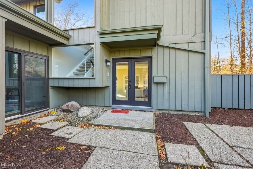 Welcome home to this beautifully updated 3-bedroom, 2.5-bath condo in the Aurora City School Disctrict.  In one of Aurora’s most desirable and unique golf course communities, Walden of Aurora, this completely updated home is set amongst mature trees, lakes, and walking paths offering both privacy and charm. Step inside to discover a freshly repainted interior, with new carpet & flooring throughout, still maintaining that classic Walden feel.  The spacious living room features a brick fireplace and access to a patio/sunroom through the sliding glass doors.  Off the living room, a large dining area and dry bar add to an area perfect for entertaining or relaxing and enjoying your privacy.  The eat-in kitchen has been updated with new appliances, modern finishes, and plenty of cabinet space. The main level also includes a convenient laundry area, half bath, and attached two-car garage.  Up the open staircase you’ll find three generously sized bedrooms, including one with a balcony and the primary. The primary suite impresses with large closets, a brick fireplace, and an updated en-suite bathroom.  The other full bathroom is conveniently located on this level as well.  Other mechanical updates include new furnace, A/C, & hot water tank; every detail has been carefully thought out.  Don't miss out on your chance to get into this move-in ready, low maintenance home and start enjoying all the community has to offer, schedule your showing today!