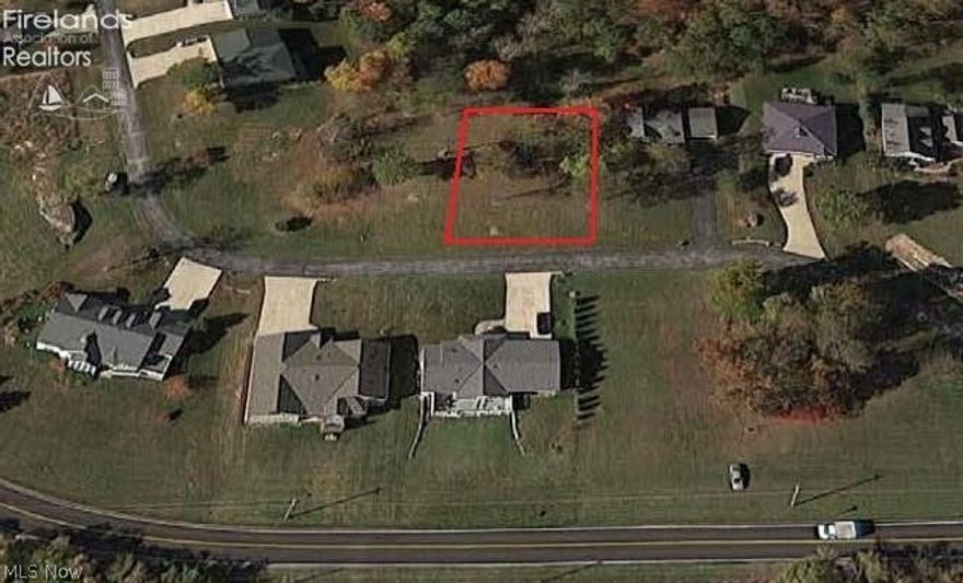 What a location to build a home! Located just off Bayshore Rd and across from Dempsey access you can have great views of Sandusky Bay and Johnson's Island! Spacious lot with trees remaining for a park-like lot to build on. Private street of just a few dozen homes. Dempsey access is a great, public launch for you boat or jet skis. Tucked away from all the hustle and bustle but still just a short drive to downtown Marblehead, Bay Point, Marblehead Lighthouse and all the other area amenities!

Drawn lot lines are approximate.