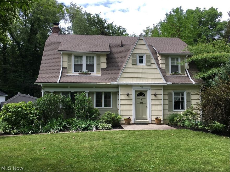 Charming dutch colonial located on a brick street in the Merriman Hills subdivision!  This neighborhood is close to schools, shopping, and entertainment, but tucked away in a quiet wooded setting that acts as a nice retreat from city life.  Welcome to 583 Malvern Rd.  The foyer greets you with great original hardwood floors.  Dining room with bookend built-ins to display photos or your serving wares.  The fully applianced kitchen features newer floors and back splash, and plenty of counter and cupboard space. There is even enough room for a center island!  Relax and read a book by the wood burning fireplace in the living room.  French doors lead to a sun room that could be a great play room for kids, or just a perfect spot to enjoy a morning coffee.  The first floor also features an updated 1/2 bath.  Upstairs you'll find a beautifully remodeled bathroom, and 4 generously sized bedrooms.  Partially finished basement is just waiting for your finishing touches.  All appliances stay.  Hom