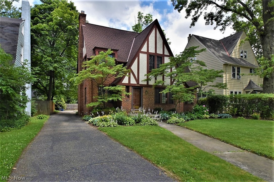 The curb appeal draws you into this classic Tudor home located in Shakers desirable Onaway neighborhood just minutes away from the tri-schools area, with low maintenance landscaping featuring hostas, ferns, hydrangeas, hollys & gorgeous pink dogwoods standing sentinel to greet you at the front door. The friendly floor plan features a spacious eat in kitchen overlooking the back yard and patio, sun room, formal living & dining rooms, wood burning fireplace and so much more. The interior is very livable in its neutral pallet and flowing floor plan as is but there is room to express your signature style creating perfection in this diamond in the rough. Sq ftg is 1st & 2nd only, to transfer with point of sale certification.