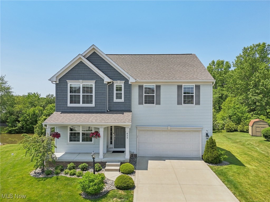 Welcome to this bright and airy home with a FIRST FLOOR PRIMARY SUITE, located on a cul-de-sac, in The Grove of Weatherstone? Located within the desirable Wadsworth school district, this home conveys grandeur with its sweeping high ceilings, ample windows overlooking the private backyard, huge bedrooms, and a walk-out lower level.
A covered front porch welcomes you inside to a flexible office/living room filled with natural light!
The great room features a wall of windows and soaring ceilings with recessed lighting, while flowing seamlessly into the open dining area and kitchen.
Prepare culinary delights in the gourmet kitchen, equipped with stainless steel appliances, a large center island/breakfast bar, extensive cabinetry, and a stylish backsplash.
Pass the spacious dining area and into a vaulted sunroom, offering panoramic views of mature landscape and access to the outdoor living space.
Retreat to the first floor owner’s suite, presenting a spacious ensuite bathroom with double sinks, a large shower, and a walk-in closet. Start your day off serenely with views of the scenic pond.
The main level also offers a laundry room and a half bath for added convenience.
Upstairs, you'll find three additional, generous-sized bedrooms and a full bathroom.
The expansive walk-out basement offers endless possibilities, ample storage space, and is plumbed for a bathroom!
Outside, enjoy the very private and quiet .85-acre lot with a deck overlooking a scenic pond.
Additional features include an attached 2-car garage and a new dishwasher (2020).
This move-in ready home blends comfort, functionality, and beautiful views—perfect for everyday living and entertaining!