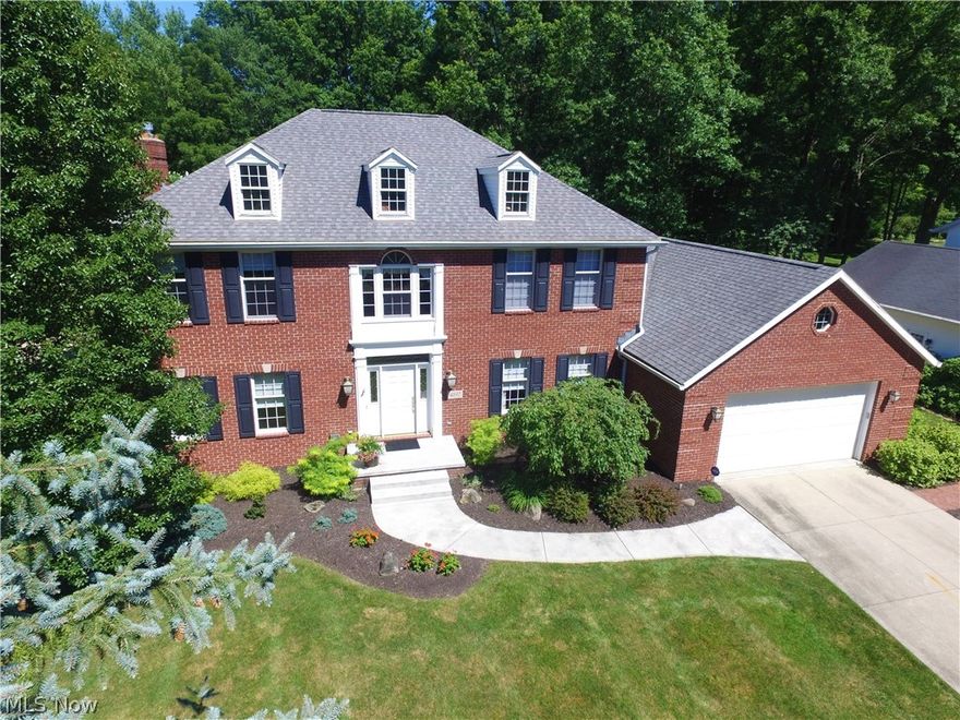 Wow...what a house! Classic, custom built colonial on quiet cul-de-sac boasts 4500+ square feet of immaculate & well-maintained living space! Featuring 5 Bedrooms & 4 Full Baths, this home must be seen to be appreciated! Custom details throughout! Formal Foyer w/ hardwood flooring welcomes you home. Huge Formal Dining Room is perfect for family holidays & entertaining! Formal Living Room connects to the Family Room. Enormous, eat-in Farmhouse Kitchen is fully applianced & offers a center island, corner pantry,
hardwood flooring, solid surface counters, ceramic tile back splash & a convenient desk area.  Large Family Room w/ brick fireplace opens to the relaxing Sun Room w/vaulted, wood plank ceiling. 1st floor office (could be BR #5), full bath, Laundry Room & Mud Room complete the main floor. Upstairs, you will discover a huge Master Suite that includes a 7 X 12 walk-in closet and an updated bath with split vanities, corner shower and jetted tub. 3 additional bedrooms offer abundant
