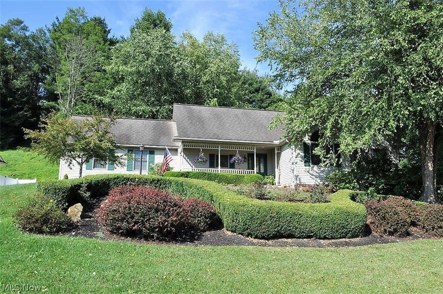 Impressive ranch style home featuring professional landscaping surrounding the home, new flower beds equipped w/stone surrounding the sidewalk. Easily access the LL w/the additional parking right outside. Through the front door you will find a huge kitchen w/a walk-in pantry, dining space, and an open concept layout to a spacious living room complete w/a stone hearth, gas-log FPLC, & vaulted ceilings. Relax on the private, covered back patio just outside of the living room w/fenced area (perfect for pets)! Down the hallway you'll find 3 bedrooms & 2 full baths including an owner suite providing a full private BA w/dual sinks, a soaking tub, & a walk-in closet! Convenient 1st floor laundry w/wash tub/sink. Heading down the stairs you will find a fully finished lower level w/walk-out, a massive family room, 2 more bedrooms, & a 3rd full bath (great for guests &/or teen suite space). Entertain w/ease whether inside or out & enjoy being just blocks from local shopping & dining. UPDATES INC