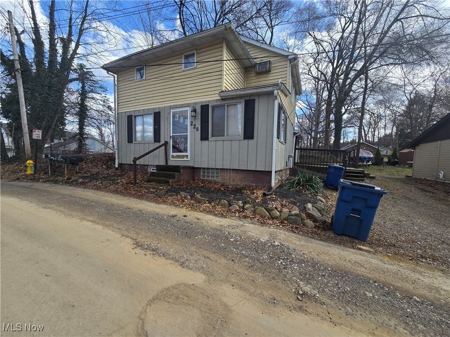 Welcome to this charming "Lakes" home in the desirable Portage Lakes area! Just steps from your front door, you'll enjoy the benefit of a waterfront association at the end of your road. As a bonus, you can join the South Akron Hills Area Recreation Association (S.A.H.A.R.A.) for a small fee, giving you access to beach and lake privileges. Additionally, a boat dock may be available for an extra cost.

This home features several updates, including a refrigerator, washer, and dryer, all of which will stay upon closing. The first-floor bedroom with a full bathroom also doubles as a convenient office space. The large 2+ car garage with electricity and a paved driveway, accessible via Gable Street, offers plenty of parking with 100 feet of frontage. The expansive yard provides ample space for parking an RV, boat, or multiple vehicles.

A nice shed with electricity adds extra storage space. All of this is just minutes from Portage Lakes State Park, complete with public boat launches!