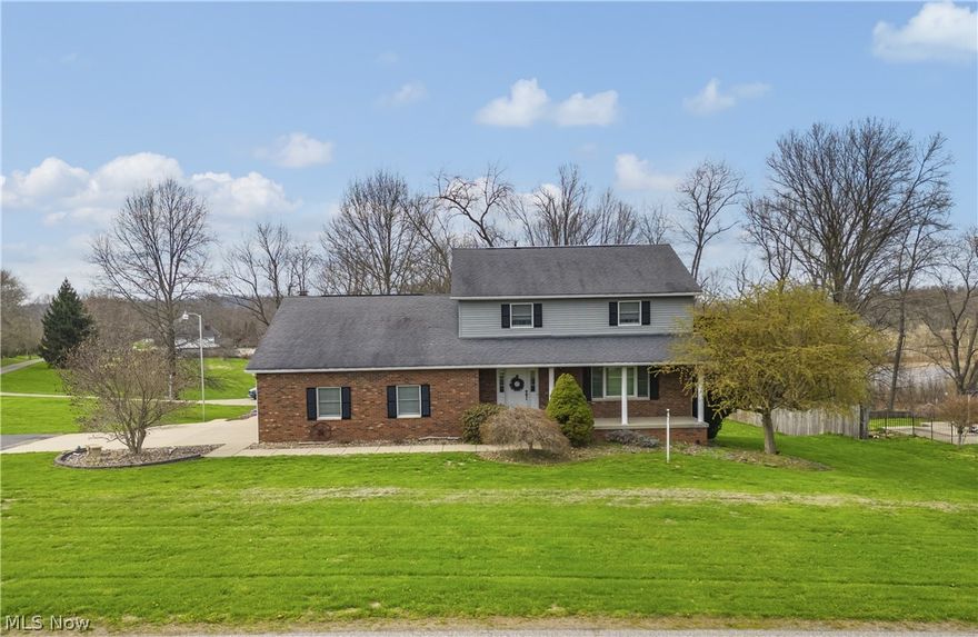 Prepare to fall in love with this spacious two-story brick and vinyl home offering nearly 2,500 square feet of comfortable living space. Designed with both everyday living and entertaining in mind, the home features both formal and informal living areas, providing flexibility for gatherings, relaxation, or quiet evenings at home.

Enjoy year-round comfort in the inviting four-season room, or step into the enclosed patio space overlooking a beautifully landscaped backyard complete with a cozy firepit area?perfect for outdoor entertaining or peaceful evenings under the stars.

The eat-in kitchen is sure to impress with Corian countertops, rich oak cabinetry, and ample workspace, conveniently located beside a spacious dining area featuring hardwood floors.

Upstairs, you?ll find three generously sized bedrooms, 2 full size bathrooms along with the added convenience of second-floor laundry, making daily routines effortless.

The finished walk-out basement expands the living space even further and offers direct access to the backyard, creating additional room for recreation, hobbies, or entertaining.

Storage and practicality abound with a two-stall attached garage plus an additional attached storage area with its own garage door, conveniently located beneath the enclosed patio.

This well-appointed home blends space, comfort, and functionality, making it an ideal place to call home.