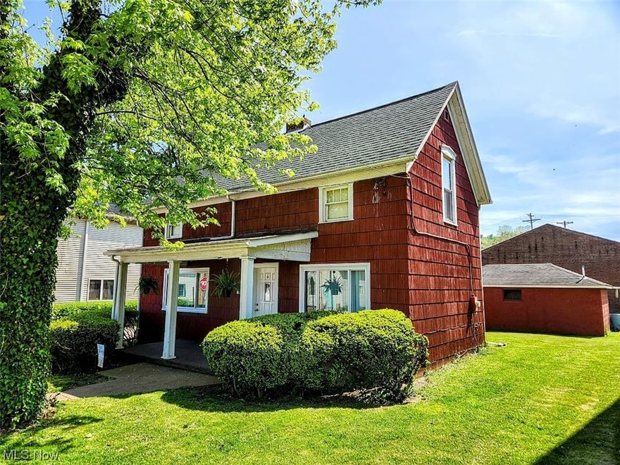 DILLONVALE!! WELCOME to 99 2nd Street! This house would be perfect as a starter home, investment property for rental income, or downsizing!!  Highlights... 2 story, 2 bed, 1 bath home with a relaxing front covered porch offering 1120 SF and a 1 car detached garage. The kitchen features VERY NICE cabinets and is open to the dining room. All rooms are comfy with a homey atmosphere. New windows, back door, carpet, and plumbing fixtures. Roof 2016. Washer and dryer stay while kitchen island and appliances do not convey. PERFECT OPPORTUNITY!!  ARE YOU READY?? CALL TODAY!