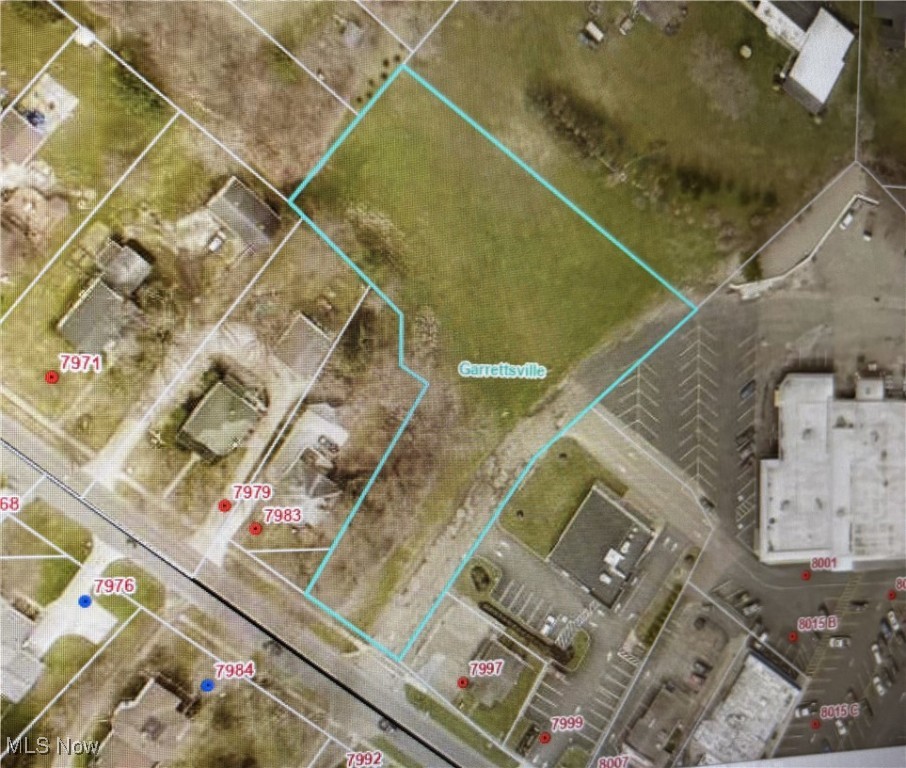 WANT A PIECE OF GARRETTSVILLE? AND WANT TO START IN A COMMERCIAL AREA? TAKE A LOOK AT THIS 1.364 ACRE LOT overlooking the Garrettsville PLAZA. Beautiful commercial lot, cleared and ready for building. All utilities are available. The best lot in town for a new business. . Do not let a BIG BOX store grab this. If you love Garrettsville, like we love Garrettsville, you will love being part of this growing community. A magnificent Place for your Castle! PRICE REDUCED TO $105,000
The Village of Garrettsville has an easement over the south edge for adding a fire hydrant and appurtenances. Seller owns part of street running back to the rear of the PLAZA. CALL FOR A MAP.