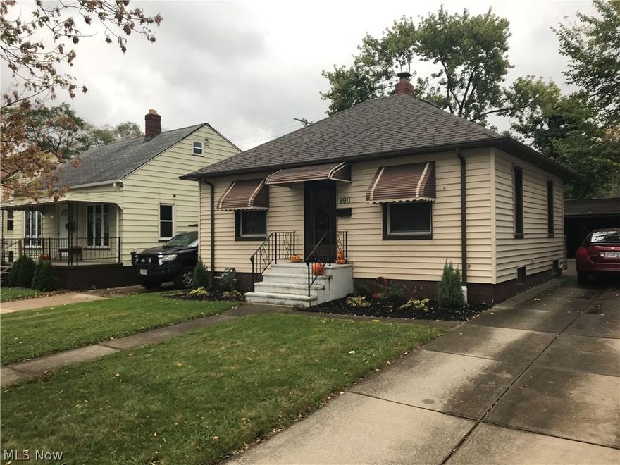 Clean 2 bedroom ranch with 1 car detached garage.