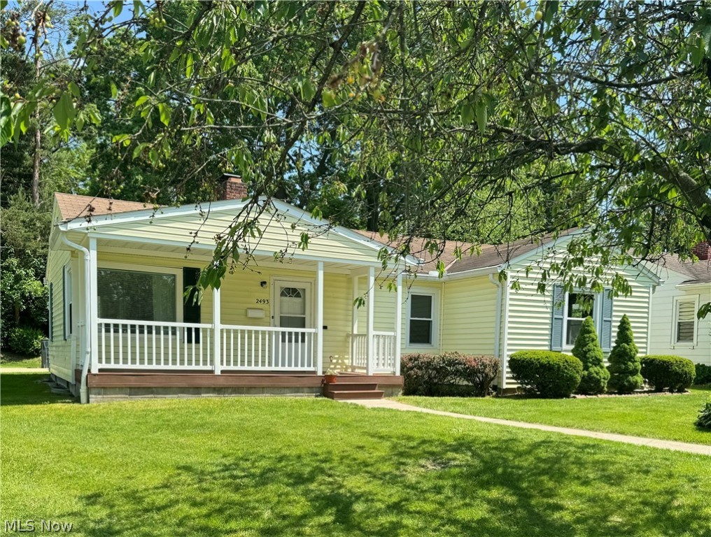 Welcome to your new RANCH home w/ breezeway in a desirable area of Cuyahoga Falls! (WHEELCHAIR ACCESSIBLE) This home has tons of curb appeal including a large front porch to enjoy your morning cup of coffee. Step into the foyer area which leads into the spacious living room w/ loads of natural light, wood-burning fireplace, and hardwood floors throughout. The kitchen has plenty of space to make it your own, all appliances equipped. Finishing off the main floor are 2 nicely sized bedrooms, a full bathroom, and the third bedroom, which was converted into a wheelchair accessible half bathroom. The converted bedroom is the perfect size for a full bathroom or laundry room, or could be turned back into another bedroom/office. The basement has been waterproofed and has tons of space for storage and an additional half bath. Attached is a 2 car garage w/ ramp. Fresh paint throughout. This home is filled w/ potential and just awaiting its new owners!! Close to expressways, dining, Portage Crossing shopping center, hiking trails, and more! You'll love to be apart of all the wonderful community events that Downtown Cuyahoga Falls has to offer. Schedule your private tour today!!