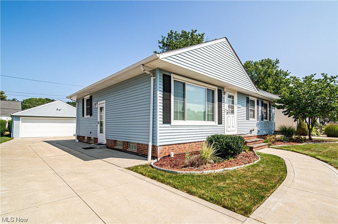 Welcome home to this exceptional ranch home in sought after neighborhood with 3 bedrooms, formal dining room, 1 full bath, unfinished basement, 2 car detached garage, and fenced in yard! This home is close to freeway access, parks, shopping and 20 minutes from downtown Cleveland! Well maintained and cared for home and all major components are in working order. A lot of natural light in the living room with wood flooring and custom window treatments. Great formal dining area with view of and access to the backyard. Remodeled eat in kitchen area with lots of cupboard space. 3 good size carpeted bedrooms with hardwood floors underneath. Full size unfinished basement with lots of possibilities and an abundance of storage. Enjoy the beautiful landscaped exterior lot with a backyard paver patio and private fenced in yard! Improvements that have been made include but are not limited to exterior patio, stone steps, fenced in backyard, waterproofed basement and newer concrete front sidewalk