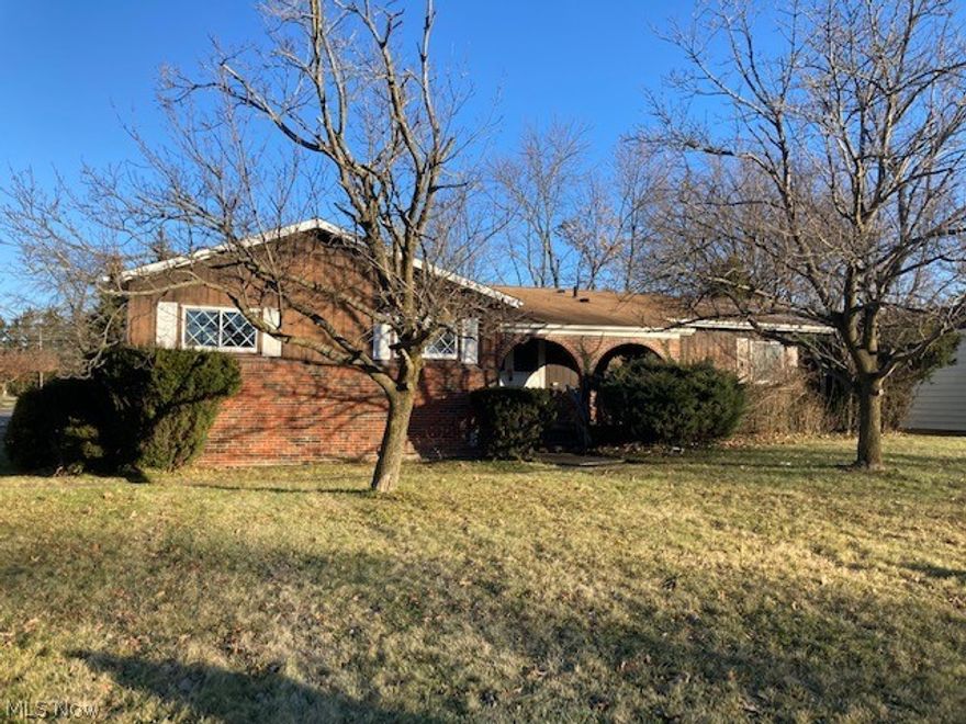 Great opportunity for one floor living in Bedford Heights!!  Upon entry you see an inviting floor plan in this custom - built ranch home, with over 2200 square feet of living space. Other features include 3 generous sized bedrooms, and 2 full baths on main floor, a 21'x15' family room w/full wall stone fireplace, spacious dining area, master bath with sunken tub, a spacious rec room w/wet bar, pool table and full bathroom, central air, deck, and 2-car attached garage w/newer garage door and opener. Easy access to freeway, shopping, and dining. This solid home has so much potential and awaits a new owner to bring it back to its full splendor!!  It is being sold “as is”