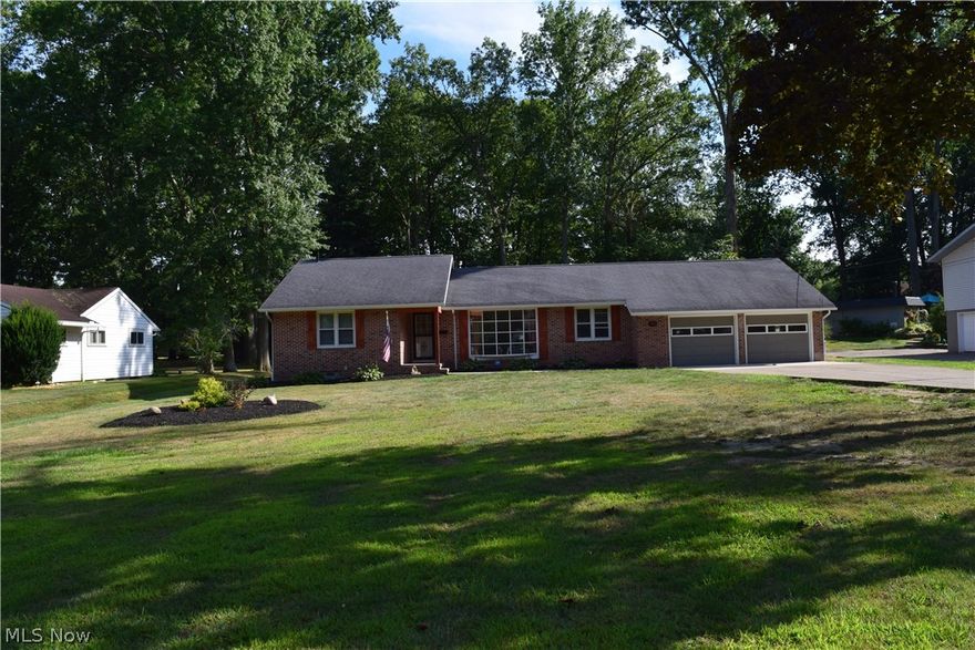 Move in ready! an acre of land in the city! Brick 3 bedroom, 2 1/2 bath ranch with large eat-in kitchen with pantry and wood burning fireplace. 1st Floor laundry and office. Full unfinished basement just waiting for you to finish. Relax in the 3 season enclosed porch with new ceramic flooring. Newer roof (2017), A/C and HWT (2018).