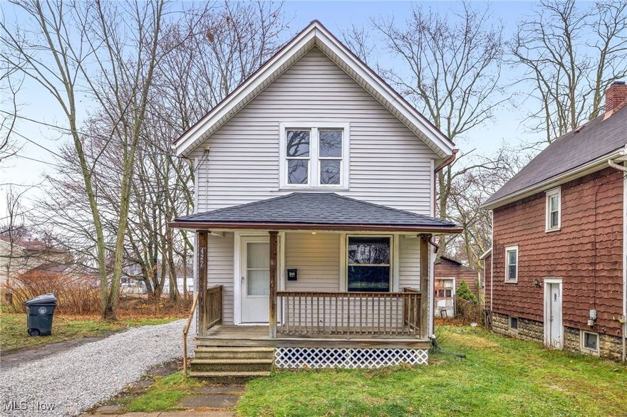 This small house packs quite a punch! Cute front and rear porches on a quiet street. New kitchen cabinets, farmhouse sink, countertops, floors, and so much more! Newer windows, roof shingles 25, HWT 23, Furnace 25, glass block windows in basement, fresh paint throughout, and a new gravel driveway.