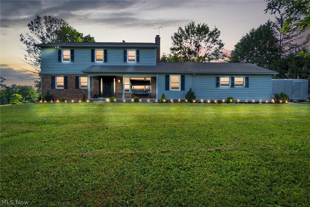 This beautiful colonial has been completely renovated on the outside and inside and is within walking distance to Chippewa Lake. The owners have added 409 sq.ft. to the home by adding a morning room and a large first floor laundry and mud room. New Roof 2019, hot water tank 2021, new appliances, septic pump 2022, new hard wood (bamboo) thoughout the entire house, New tile in kitchen, hallway and newly renovated bathrooms and granite countertops in new kitchen. These stunning 5 acres with a pond provide gorgeous views from every window. In the backyard you'll find a fenced garden, chicken coop, 2 story shed, 3 apple trees, raspberry and currant bushes. The covered front porch is great place to sit and enjoy the yard. Save money monthly with NO gas bill, there is FREE natural gas on the property.