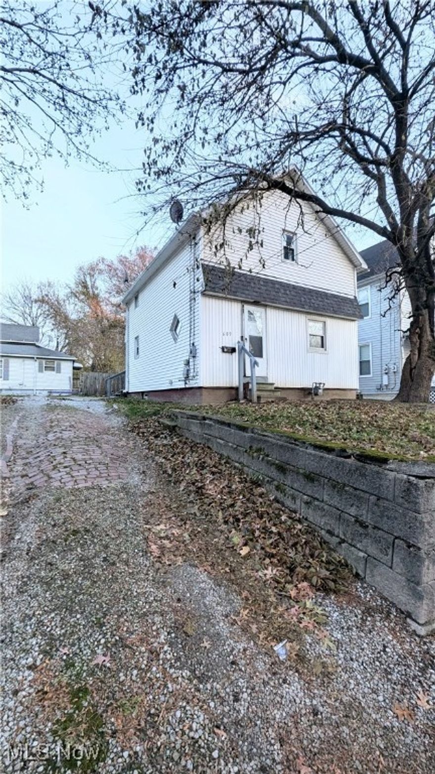 Imagine owning a piece of Akron history in this charming, move-in ready two-story century home at 689 Kling St! Built in 1898, this cozy 780 square foot gem offers incredible urban convenience and low-maintenance living. Step inside to find 3 spacious bedrooms (including a flexible first-floor option) and an upstairs bath showcasing a timeless claw-foot tub and shower combo—a delightful nod to its heritage. The eat-in kitchen opens to a lovely rear deck, perfect for enjoying quiet mornings or evening dinners. Enjoy comfortable living with easy-to-clean LVT flooring throughout most of the home, a cozy carpeted living room, and ceiling fans in every room, all complemented by a new furnace installed in 2022 (no central air). Location is everything: this prime city spot places you minutes from The University of Akron, a vibrant mix of entertainment, restaurants, and shopping, and major medical facilities. With immediate access to highways and bus lines, your commute is effortless. Secure your affordable, convenient city lifestyle today!