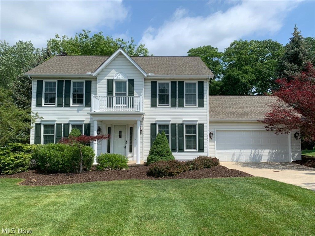 Custom Built Royal Valley Colonial in North Royalton. You will love the turned staircase and the gleaming Maple Flooring as you enter the Foyer. Move In Ready best describes this meticulous 4BR/2.5BA Colonial with Rec room and office in the finished lower level. The spacious Living Room & Dining Room flow into the open Kitchen w/all appliances and a bayed eating area that overlooks the brick patio landscaped w/blooming perennials and shrubbery. There's a basketball hoop or expanded patio for out door seating and activities. Fire pit, too! The family room with WB Fireplace, half bath and first floor laundry complete the main living area. The second floor consists of the Master Bedroom & Bath, with Double Shower & Tub, and 3 spacious bedrooms with ample closets. Updates include: Roof, Furnace, Central Air, Range, Refrigerator, Washer, Dryer, Front windows, Bali Custom Blinds, Front Portico, Front door & Storm door and Exterior Lighting! Schedule your appt. today!