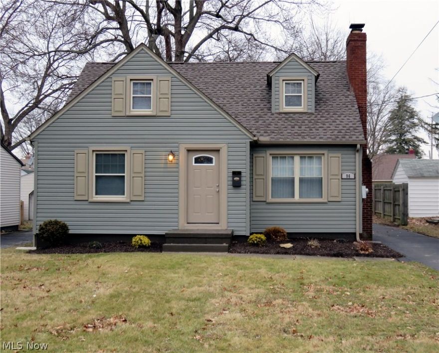 Updated & Adorable! Freshly Painted with 3 Bedrms, Updated Kitchen & Bath, New Vinyl Siding & Carpeting, Newer Roof, Fireplace, Full Basement w/Glass Block Windows, Garage, Central Air & More!