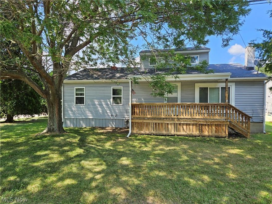 Must see this beautiful 3-bedroom 2- full bath Cape Cod! With many recent updates throughout. This property features 2 lots totaling 108x165. Large 36x30 Outbuilding with concrete floor and 10' x 9' lean-to, perfect place for workshop or to store your toys! 2 large bedrooms on the 1st floor. 3rd bedroom/ loft 2nd floor. Open kitchen and dining area. First floor laundry and updated bathrooms. Covered front porch and full deck in the back.