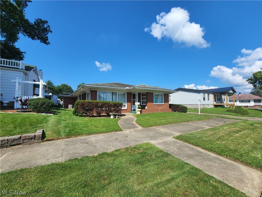 This house has been professionally staged to show the Buyer the potential this house has to offer.  The oak, pine and cedar trim, walls and closets compliment this 2-3 bedroom, 1.5 bath brick ranch.  Some fresh paint.  The foyer has laminate flooring.  The large living room has large windows to let the natural light in and a gas fireplace.  The kitchen includes the dishwasher, cooktop and oven, lots of cabinets.  Walk down the hallway from the kitchen to the bonus room with a side door which could be used for a mud room or storage room or 3rd bedroom, farther down the hallway is the laundry room with new flooring.  The second hallway includes a built-in desk, a hallway closet.   Two additional bedrooms all with large cedar closets, the 3rd bedroom/office/sewing room has new flooring.  The bathroom has a closet and cupboards.  An attached one car garage.  The exterior windows have been painted.  The garage door and patio have been painted.  The back yard has a partial fence.