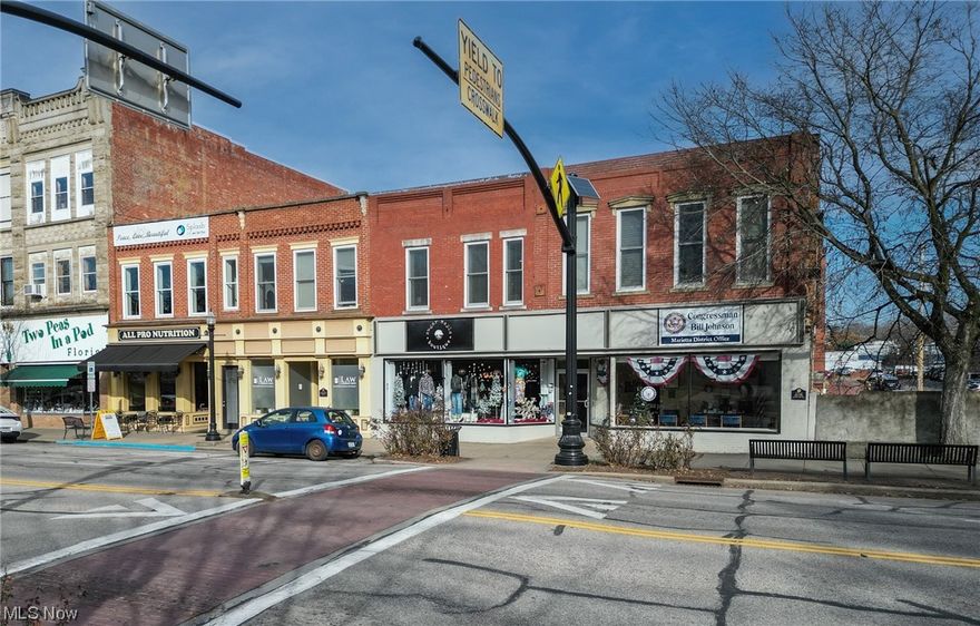 Attention all investors!! This commercial property presents a remarkable opportunity to own a historical front St. building in the downtown Marietta area that already has successful businesses as renters. Which include All Pro Nutrition, Peace Love and Beautiful, Dodd's Attorneys and an apartment. Property includes two buildings- 250 Front Street and 252 Front Street.  There is alley street parking with 7 spaces.  This property is located in the commercial area of downtown Marietta, Ohio and is surrounded by other high-end eateries, coffee shops, retail shops and various entertainment options, making it a highly sought-after location for investment opportunities.  Don't miss out on this rare opportunity to own this prime commercial property in the heart of Marietta!!! Commerical buildings beside are also available.  MLS # 5005973