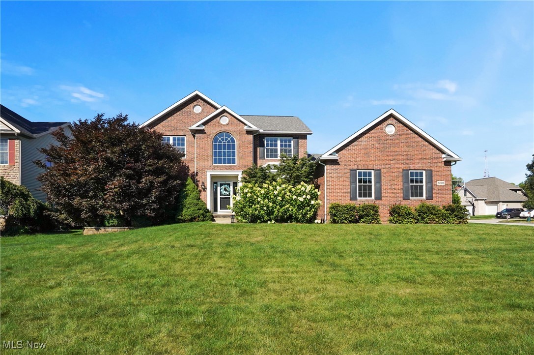 Welcome to this beautifully updated brick colonial in the desirable Bayside Lake community of Stow. This 4-bedroom, 3.5-bath home offers 3,758 sq ft of stylish, move-in-ready living space. The open-concept kitchen, eat-in area, and great room are filled with natural light. The kitchen features quartz and wood countertops, new stainless steel appliances, a farmhouse sink, and updated lighting and hardware. New wood floors run through the living room, dining room, and study, with all-new carpet throughout the rest of the home. Upstairs, you'll find a spacious primary suite with a walk-in closet and en-suite bath, plus three additional bedrooms and a full bathroom. The finished basement includes a workout area with rubber flooring and a full bath. Additional highlights include a 3-car garage, private back patio, first-floor laundry, and a new roof (2021). Conveniently located near shopping, dining, and major highways, this home offers modern living in a well-established neighborhood.