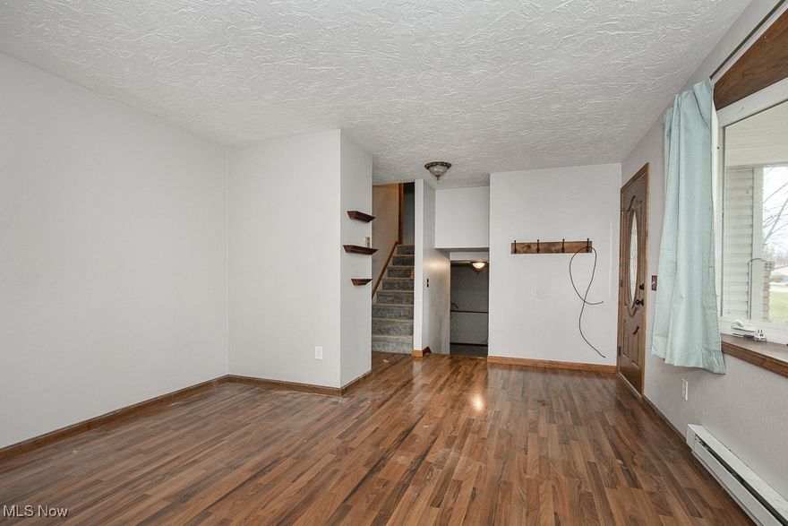 Discover this 3-bedroom, 1-bath split-level home nestled in a peaceful and convenient neighborhood. Sitting on a generous .3-acre lot, the property boasts a spacious backyard, perfect for outdoor activities and entertaining. The large deck and 20' x 12' shed add to the home's appeal, offering ample storage and space to create your outdoor oasis.

Inside, the main level features easy-care LVT flooring, while the upper and lower levels are carpeted, providing a cozy feel. The home is in need of updating, presenting a fantastic opportunity for someone with vision to bring it to life. With solid mechanicals in good condition, this home offers a strong foundation to build upon.

Whether you're an investor, a DIY enthusiast, or looking for a blank slate to create your dream home, this property is brimming with possibilities. Don't miss your chance to transform this house into a true gem!