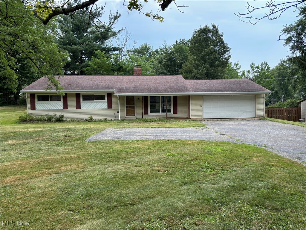 Never judge a book by its cover! You'll be impressed when you step inside this 3 bedroom, 2 full bath ranch home that been nearly all updated on the interior. All new kitchen with new stainless steel appliances and quartz counter, all new paint throughout, all new LVT flooring and new carpeting in the bedrooms. And there's much more. The vaulted living room greets you with a gas fireplace. Off the dining area is a new 15 x 11 deck. Off the kitchen is a beamed, vaulted oversize family room. There's also a 3 season enclosed rear porch with stone flooring. Two car attached garage, storage building and a large lot. Home Warranty included. Make your appointment today.