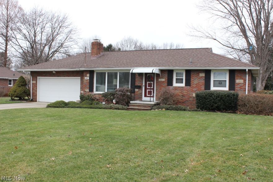 Pristine & beautifully updated 3 bedroom brick ranch having 1080SF, 3 season sun room & 4 car (20x51) tandem attached garage* Living room with gas log fireplace, fan & carpet over wood floor* 3 bedrooms (2 with fans) with wood floors* Eat in kitchen with wainscoting, built in china cabinet, refrig & range* Full unfinished basement with glass block windows* 3 season sun room* Tandem 4 car with side garage door opening to patio- great for summer get togethers* Updates,including but not limited to, fireplace converted to gas (2018), hot water heater, carpet, garage door & opener (2016), windows & 30 yr. single layer shingles (2009), gutters (2010), leaf guard & electric box (2011), 90% eff furnace & humidifier (2003), electronic air cleaner (2004), water softener (2012), sump pump (2014)* Low utility bills* Convenient location in the Portage Lakes area* Home warranty provided* Great value in City of Green*