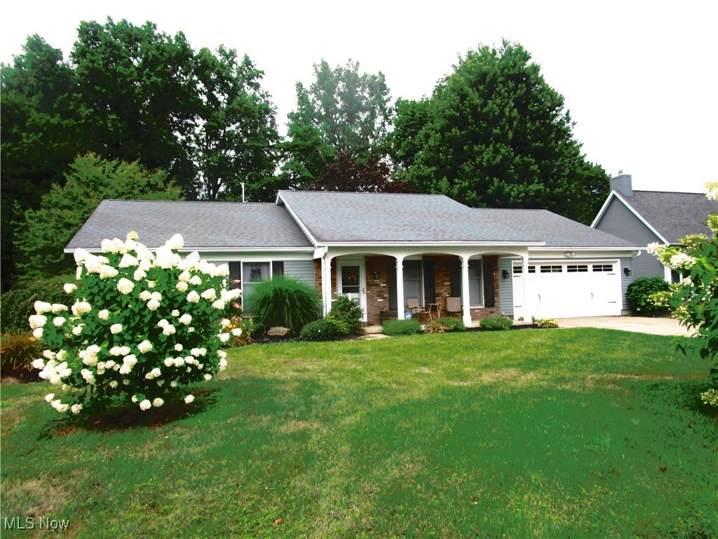 What a great buy if you're just starting out...or ready to kick back! This perfectly sized 3 bedroom, 2 full bath ranch offers easy one floor living, a formal dining space, a large cozy living room with a fireplace and a handy laundry room just off the efficient galley kitchen! All appliances are included, along with the bed, two TV tables and the large screen TV. (Or seller will remove - Buyer's choice). The attached garage has hot and cold water, attic storage space and a bonus room! Tucked in the back is a 17 x 13 heated room - great for crafts, exercise equipment, extra storage, wood working projects or starting your garden plants early. The large 1/2 acre lot is lushly landscaped and there's a 24 x 6 shaded front porch, a 15 x 12 concrete back patio, a storage shed for extra lawn care items and a concrete driveway. Located just minutes from shopping, the Freeway, restaurants, the Lake, Schools and medical facilities - you won't drive far no matter what you need!