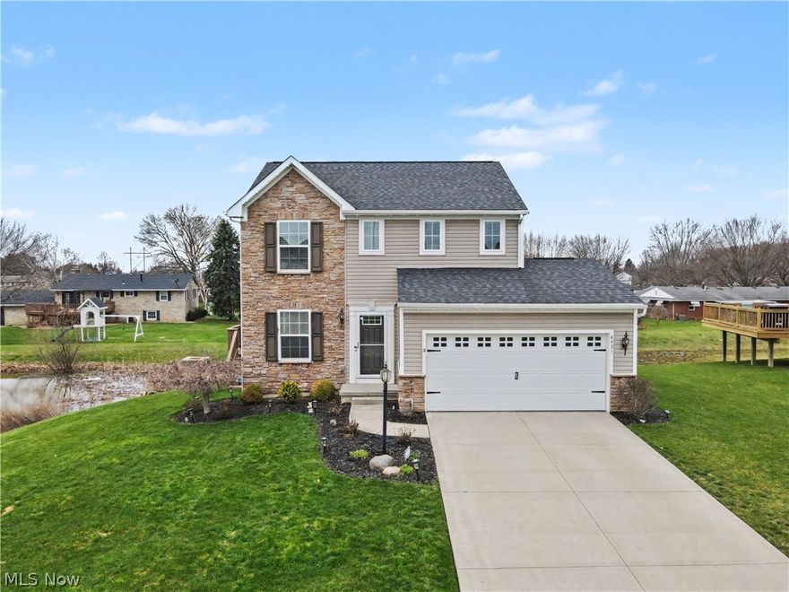 Welcome to this beautiful colonial style home located in Perry Township. As you make your way inside the open concept of a spacious living room that flows into the eat in kitchen. Off the kitchen you can make your way outside onto the deck that overlooks the back and side yard.  As you make your way back inside, the laundry room is conveniently located on the first floor that could also  with a half bath right around the corner. Heading downstairs, you have a large open space that can be finished to give you an additional living area. Upstairs features three bedrooms alongside two full baths. This home is move in ready and just needs you to make it yours. Call to schedule your private showing today !