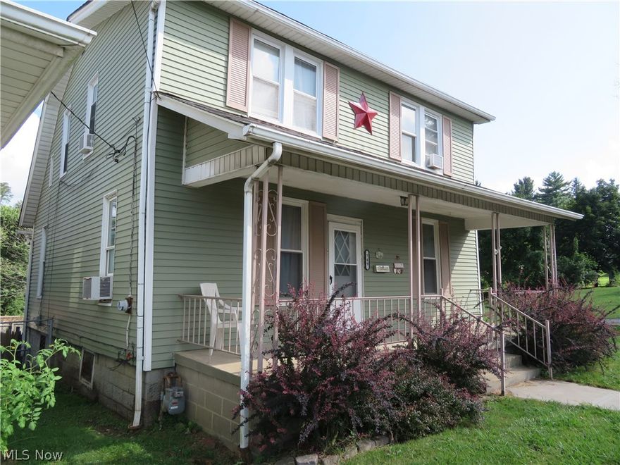 Inviting front porch on this 3 bedroom home. Convenient location minutes walk to Barnesville Park.   Large fenced in lot for privacy.  Concrete pad poured ready to build you garage if you desire to do so.  Mineral rights are leased and do not transfer.