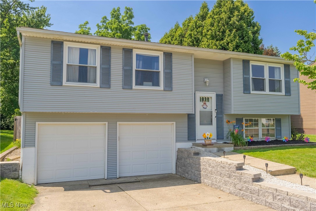 Back on the market — no fault of the seller! This beautiful home is available again and ready for its next owner. Enjoy the freshly painted exterior that adds to the curb appeal and charm. Don’t miss your chance to make this property yours!
Welcome to this inviting and thoughtfully cared-for bi-level home in the heart of Perry Local School District! Featuring 3 bedrooms, 1 full bath, and a finished lower-level rec room, this home offers a comfortable and functional layout perfect for everyday living. The bright eat-in kitchen opens to an upper deck, with steps leading to a covered composite deck below—an ideal setup for outdoor dining, relaxing, or hosting family and friends.
Enjoy the privacy of a fully fenced backyard, complete with a storage shed and plenty of room to play or garden. Recent improvements include updated flooring, a new refrigerator, brand-new furnace (March 2025), new front retaining wall (2024), updated electrical with smart meter (June 2023), sump pump (2021), and water softener (2020). The 2-car attached garage adds everyday convenience, and the sellers are offering a home warranty for added comfort.
Located just minutes from shopping, restaurants, parks, and more—this home blends warmth, functionality, and an unbeatable location nestled in a quiet neighborhood. Come see all it has to offer!