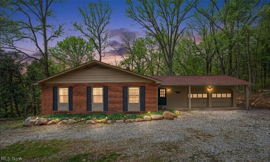 Rare 1.69-Acre Wooded Oasis in the Heart of 44223 | Fully Renovated | Woodridge Schools. Discover the perfect blend of modern luxury and total privacy at 3050 State Rd. This isn't just a home; it’s a 1.69-acre retreat that extends all the way to a tranquil, private stream. Step inside to find a masterclass in restoration. The original solid hardwood floors have been meticulously refinished to a mirror-like glow, flowing seamlessly throughout the home. Every room features a fresh, designer paint palette accented by brand-new, modern baseboards and custom blinds. Maximum Comfort: Large windows have been fully serviced for effortless operation, including a stunning new Picture Window that frames your private forest like a living piece of art. Spa-Like Baths: The primary bathroom has been completely transformed with high-end finishes, while the second bath boasts a comprehensive refresh. The Grounds & Potential: Rarely do you find a lot of this magnitude in Cuyahoga Falls. The backyard is a lush, wooded canopy offering ultimate seclusion, leading down to a peaceful creek. 1.69 ACRES: Your backyard literally goes all the way to a creek. Hiking and camping in your own yard? Yes, please! The "13-Course" Advantage: The walk-out basement is a game-changer. With an impressive 13-course block height (rare for the area) and a dedicated private entrance, this space is ready to be converted into a luxury In-Law Suite, a high-end home gym, or a premium home office. Location: Situated in the sought-after Woodridge Local School District, you are minutes away from the shopping and dining at Portage Crossing and easy highway access, while feeling miles away from the world in your private forest. Upgrades include: New refrigerator, stove, range hood, exterior doors, fully serviced windows, new baseboards, full interior paint, and professional landscaping. Schedule your private tour today-opportunities to own this much land with this level of finish in 44223 are nearly extinct!