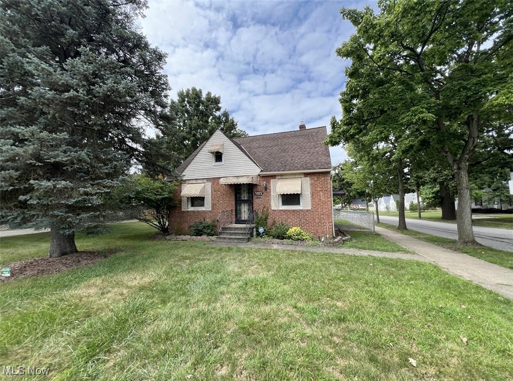 Charming all-brick Cape Cod with solid construction and great bones, set on a large lot! This 3-bedroom home offers two bedrooms on the main floor and a large third bedroom upstairs, perfect for a private retreat. The heart of the home features a cozy living space and a nicely finished basement complete with a rec room, gas fireplace, and bar ideal for entertaining or relaxing. Outside, enjoy the expansive fenced in yard that provides plenty of room for play, gardening, or outdoor gatherings. Recent updates include newer HVAC, roof, windows, and hot water tank, giving peace of mind for years to come. Don’t miss this opportunity!