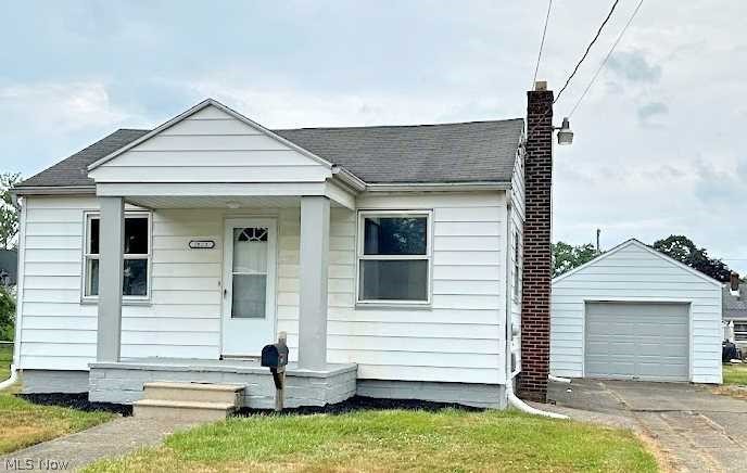 Updated one floor home with two bedrooms. Open concept from living room to kitchen. New carpet, floor, paint throughout. Furnace and A/C approximately 4 years old. Great enclosed back porch and one car detached garage. Three parcels make up this .41 acre yard on a corner lot. This is not a drive by home. Ready for you to move in and enjoy energy efficient living.