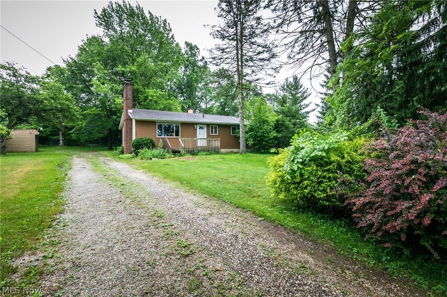 Rare, charming and well kept ranch home on large, sparsely treed lot boasts pleasant landscaping and relaxing open concept interior. An inviting, vaulted ceiling greets guests over the living and dining rooms, accented with a beautiful wood burning fireplace set in floor to ceiling natural brick. Experience life in sought-after Nordonia; Minutes from the freeway, parks, shopping, and schools with none of the drawbacks to accessibility. Enjoy being in the heart of everything and still come home to a quiet street to enjoy a wood fire in your hearth or sit out and overlook the yard from your front deck. All you have to do is move right in! This house is one step from single floor living- new owner could move laundry up and enjoy a full (now partially finished) basement, ready to be re-imagined as entertainment, storage, work out or office space. Complete 2010 renovation included appliances, bathrooms, windows and roof. Home warranty offered for peace of mind, even though the stove has nev