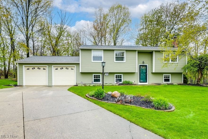 This well maintained 3-bedroom 2 full bath home is located on a cul-de-sac. There is an attached 2 plus car garage. The kitchen is open to the dining area with hard wood floors and all the appliances stay. There is an updated sliding glass door that leads to the freshly painted deck and private backyard. This home is very spacious with a family room and bonus room on the lower level. The bonus room could be used as a fourth bedroom or office. There are many options. The laundry room is very spacious with plenty of room for storage. The washer and dryer stay. The 50year roof was new in 2020. The vinyl siding and gutters were new in 2017. Carpet on main level was new in 2022. The 10x16 shed stays. Home warranty provided. A great opportunity to make this home your own.