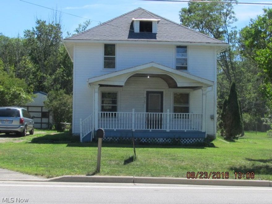 Garage is 12x40 tandem 2 car metal sided, 1.22 acre lot wooded to rear, wood flrs throughout, 6x15 enclosed porch, 8 x 17 covered front porch, property is in Medina Township no city income tax , exterior has been painted within last 60 days,also some interior painting and some wood floors refinished