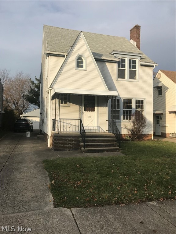 Old wold charm galore! This newly renovated gem won't last! Freshly professionally painted from top to bottom. Lots of beauty here! Newly refinished hardwood floors throughout. Wide, newly refinished baseboards, crown molding, and trim. Newly refinished doors with original glass handles. Newly added first floor powder room. High ceilings on main floor and upstairs. Large living room with fireplace. Large dining room with original built-in cabinet. Updated second floor bathroom. Large bedrooms. Newly added fourth bedroom. Newer kitchen with freshly refinished wood cabinets, new granite counters, new, high-end vinyl plank flooring made in Germany, and new LED lighting. Large professionally refinished deck. Basement waterproofed by Ohio State Waterproofing. Extra large 2 1/2 car garage with walk-up attic and new roof (2018). This home has received lots of TLC and it shows! New Garage Opener. Move-in ready!