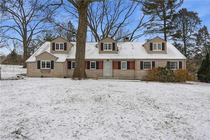 Delight in the beauty of this gorgeous Cape-Cod style Avondale home on such a stunning setting! So well loved by it's long-term owners,  home is filled w/ original character, timeless charm, gorgeous flooring, French doors, & woodwork. Many recent mechanical updates including a brand new Furnace and CAC.  Foyer entryway opens into the spacious Living Room w/gas fireplace & great backyard views out the large Bay window. Enormous Dining Room, perfect for entertaining a large crowd, w/double closets. Kitchen w/ SS appliances, Corian Counters, Maple flooring & cabinets. Sunny 4 Season Room addition w/built-ins & 2nd Fireplace. Walk out onto the back Deck & Patio, lovely landscaping. 1st Fl full Bath. Huge Master BR w/window seat, all BR's original hardwood flooring. Cedar closet.  Finished LL Rec Room w/bar & countertop area, perfect spot to relax & enjoy. 1/2 bath in LL. Owners have also replaced Windows, Roof, Driveway, sidewalks, doors, Siding, hot water tank, updated Baths & more. Great curb appeal w/the rear-entry garage, park-like setting in this highly sought after neighborhood of Avondale, so close to everywhere you need to be. This home is ready for it's next chapter so a new family can love it too!